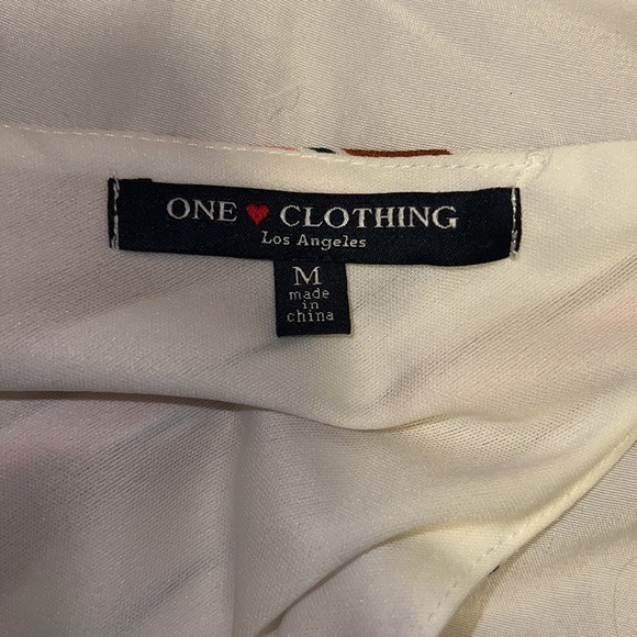 Multi-colored striped romper - Picture 3 of 4